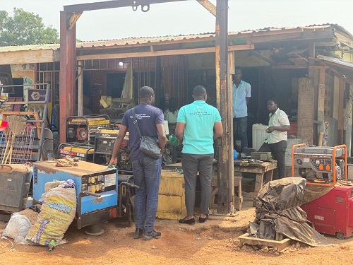 Some ORC staff educating shop owners on the need to register their businesses Some ORC staff educating shop owners on the need to register their businesses