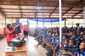 A student from Garrison Primary demonstrating how to brush their teeth