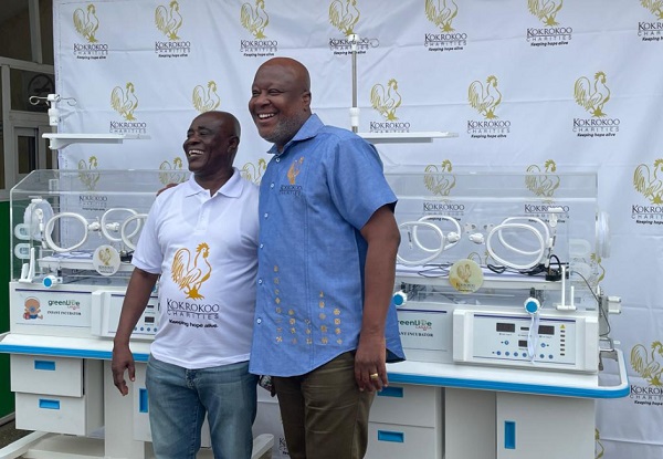  Mr. Kwami Sefa Kayi, the Founder and Chief Executive Officer of Kokrokoo Charities Foundation with Mr. Richard Quansah, owner of R&B Farms and Richie Plantations Limited  