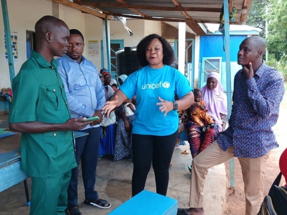 Porbilla Ofosu Apea, Health and Nutrition Officer at UNICEF, Tamale Field office interacting with some health workers
