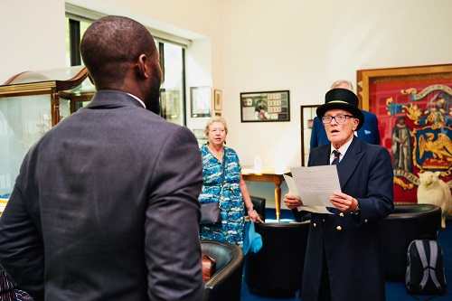  Emmanuel Nii Odartey Lamptey meeting Chris Edge and his court chamberlain, Corinna, who nominated him for the award