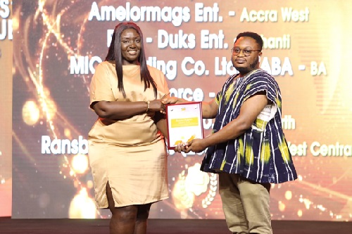 West Central based Ransbet Supply 2003 Ltd receiving award for 2nd Best Onga Powder Distributor.