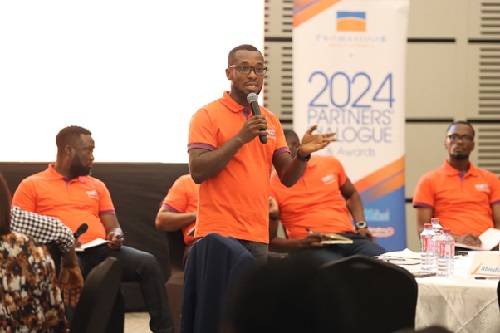 Sales Control Manager, Mr. Happy Dzah addressing distributors during the Town Hall meeting. 