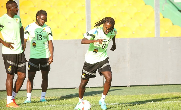 some players kicking the ball about