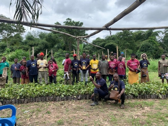 Some of the beneficiary farmers with Ivy and her team