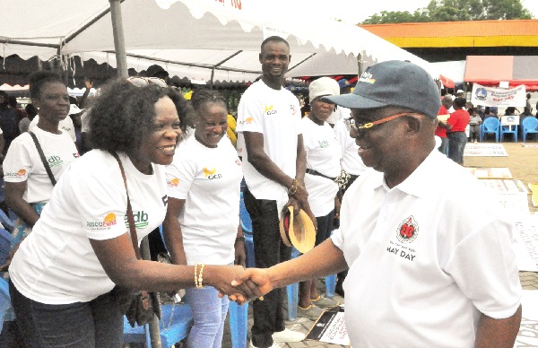 Dr Archibald Yao Letsa, Volta Regional Minister, in a hearty handshake with some members of the Judicial Service Staff Association of Ghana, at the May Day celebration Dr Archibald Yao Letsa, Volta Regional Minister, in a hearty handshake with some members of the Judicial Service Staff Association of Ghana, at the May Day celebration