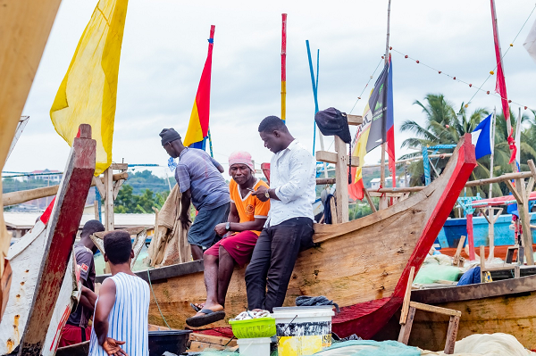 Fishermen at Axim, sharing their thoughts on how climate change is impacting their job