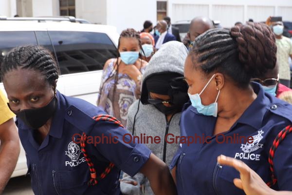 Akwapem Poloo being led out of the court premises to serve her sentence