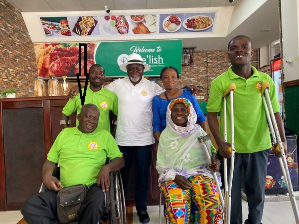 Azumah Nelson (in hat) with Mr Mends (arrowed) and other members of the More Hope for the Disabled Foundation Azumah Nelson (in hat) with Mr Mends (arrowed) and other members of the More Hope for the Disabled Foundation