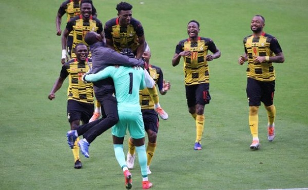 Ghanaian players run towards Abdul Manaf Nurudeen to celebrate victory Ghanaian players run towards Abdul Manaf Nurudeen to celebrate victory