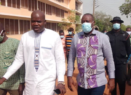 Mr Abdulai Abdul-Malik, Principal of the Tamale Nurses and Midwives Training College conducting Dr Ibrahim Mohammed Awal, Business Development Minister (right) round the college