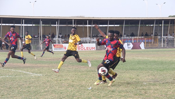 Cities Jonah Attu Quaye shields the ball away from his marker