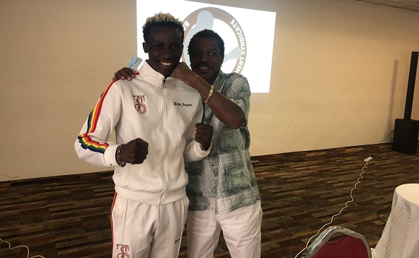  Samuel Takyi (left) with his trainer/ manager, Ike Quartey
