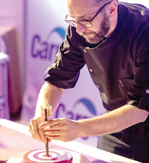 Chef François Galtier curating 'The Greatest Hit' masterpiece.