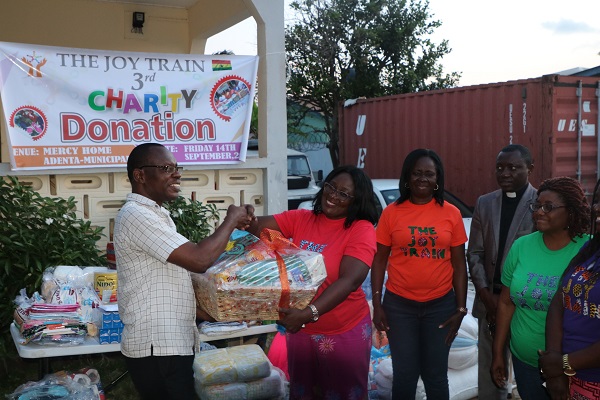 Mrs Mabel Amoako–Atta presenting the items to West Africa Mercy Ministries Mrs Mabel Amoako–Atta presenting the items to West Africa Mercy Ministries