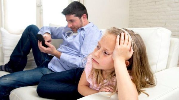 Dad on phone forgetting daughter