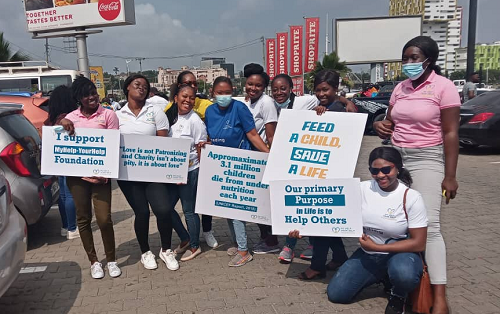 Some of the team members displaying pladcards