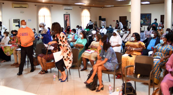 British High Commissioner to Ghana, Harriet Thompson and Country Director of Plan International Ghana, Mr Solomon TesfaMariam, getting ready to join the high table
