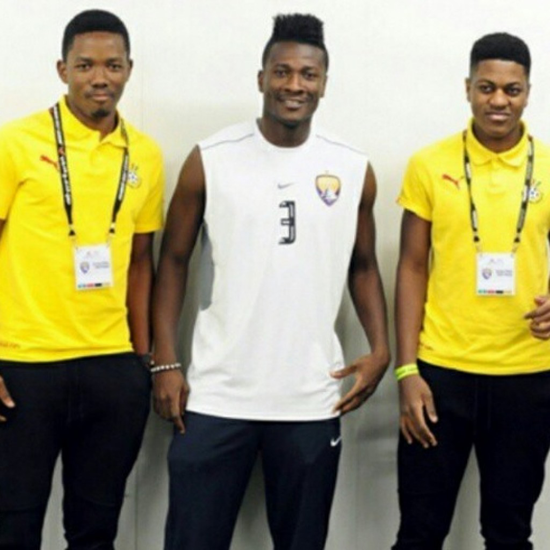 Asamoah Gyan with Sharaf Mahama right and a friend 