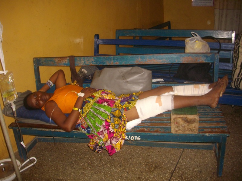One of the accident victims lying on the bench after recieving treatment from the medical team waiting for an ambulance to be referred to KATH