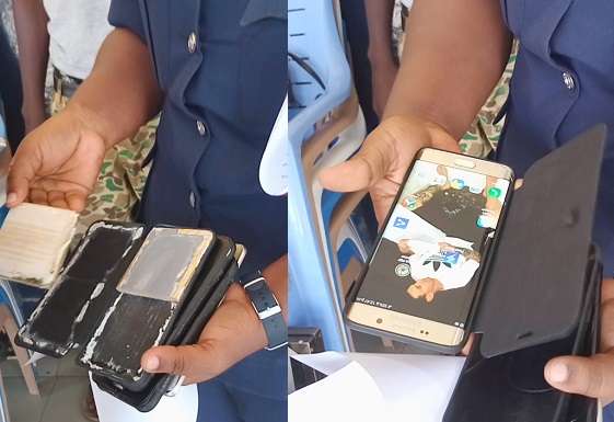 Some of the mobile phones stuffed with tiles. 