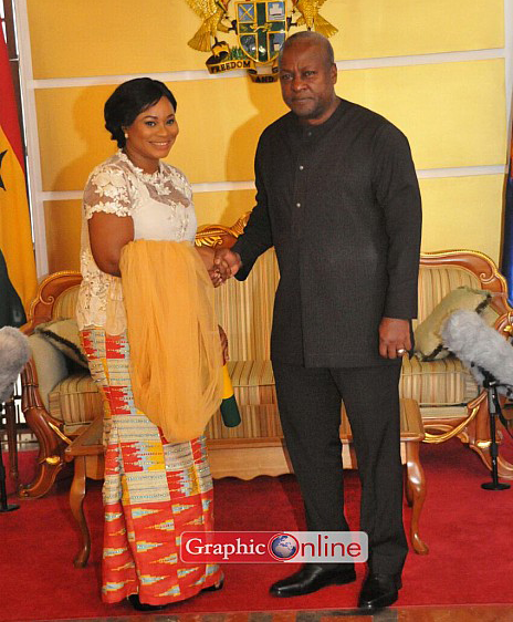 Charlotte Osei being congratulated by President Mahama. Picture by Ebo Hanson