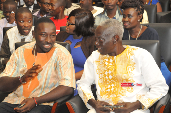 Dr Afari Gyan in a chat with one of the health workers at the awards ceremony. Picture by Ebow Hanson 