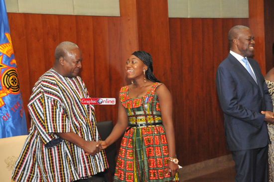 President Mahama congratulating one of the award winners. Picture by Ebow Hanson