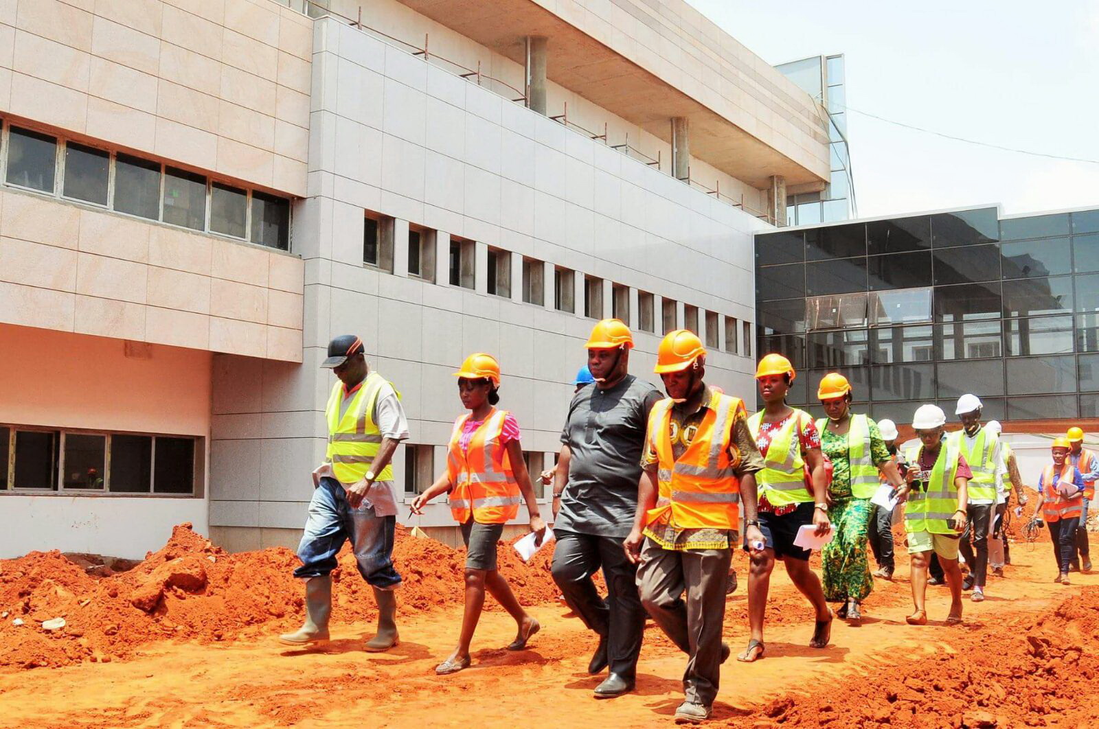 Dr Victor Asare Bampoe 3rd left and other officials being conducted around the project site Dr Victor Asare Bampoe 3rd left and other officials being conducted around the project site