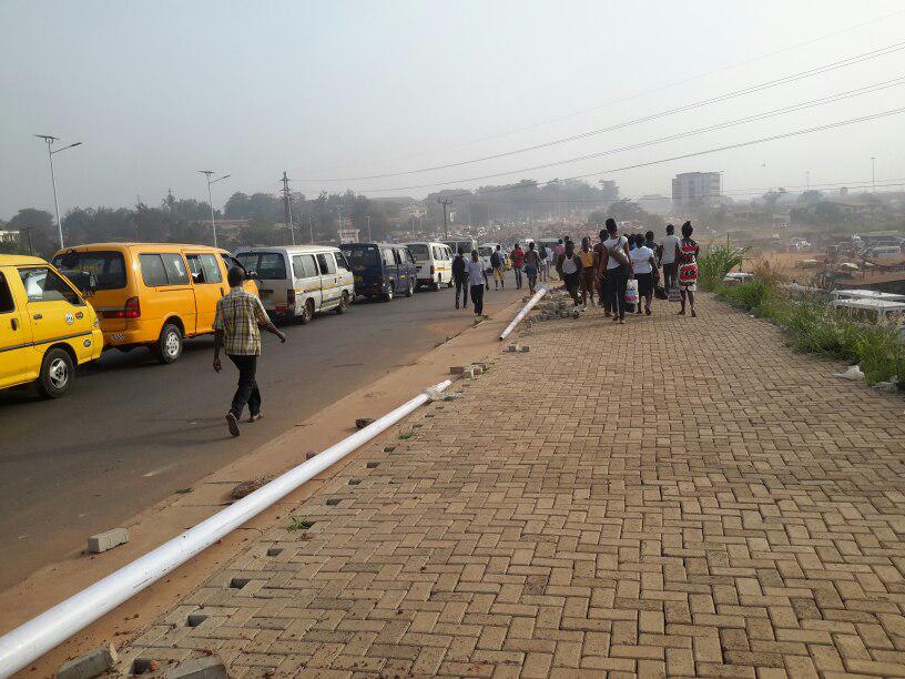 Some commuters walking to their destinations