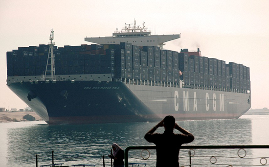 The largest and newest container ship in the world  the CMA CGM Marco Polo  sails through the Suez Canal ahead of the opening ceremony