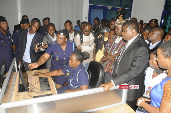 Mrs Esther Kwakyewa Amekudji (4th left), Senior Revenue Officer at the GRA, taking the media through the activities at the Customs Technical Service Bureau (CTSB) during a tour of the facility in Accra. Looking on are Mr George Blankson (3rd right) Commissioner General,Ghana Revenue Authority (GRA) and other officials.