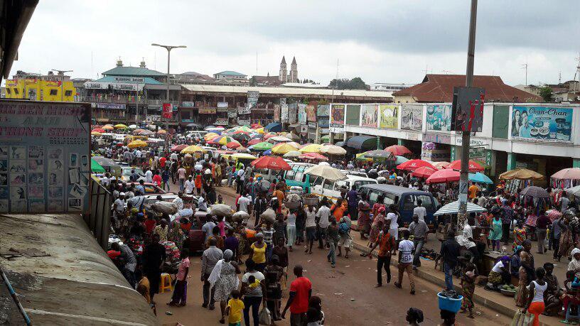 The traders carrying their goods out of the market