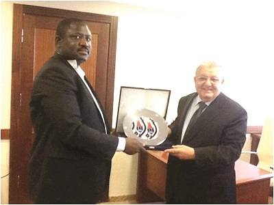Mr Adam Abdul Nasser (left) receiving an award from Lawyer Ahmet , first vice chairman of Istanbul Municipal Authority.