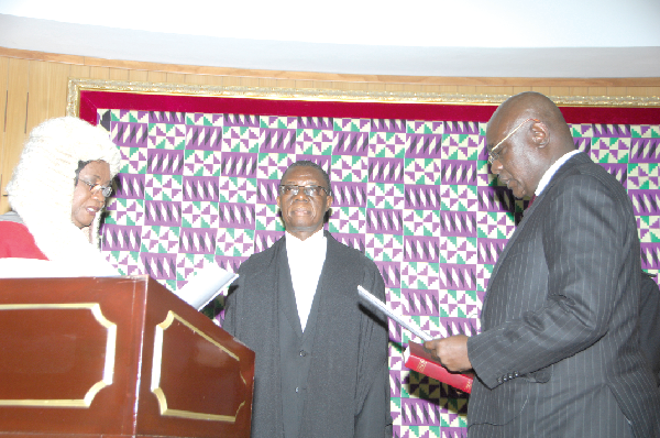 • The Chief Justice, Mrs Georgina Wood swearing into office the Speaker of Parliament ,Mr Edward Doe Adjaho, as the acting President of Ghana. Picture: EMMANUEL QUAYE