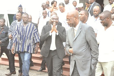 Dr Mahamadu Bawumia (middle), one of the petitioners, exchanging pleasantries with Mr K. Attafuah, a former boss of the National Petroleum Authority (NPA).