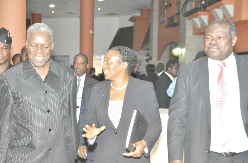 Dr Alberta C. Hagan (middle), of the Bank of Ghana explaining a point to Vice President Kwesi Amissah Arthur (left), at the 18th annual conference organised by the Department of Economics of the University of Ghana in Accra. With them is Professor Ernest Aryeetey, Vice-Chancellor of the University of Ghana, Legon.