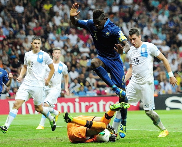 France's Paul Pogba in action against Uruguay's Guilermo De Amores. Photo: Getty Images