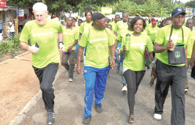 Some of the participants walking to the El-Wak Stadium.