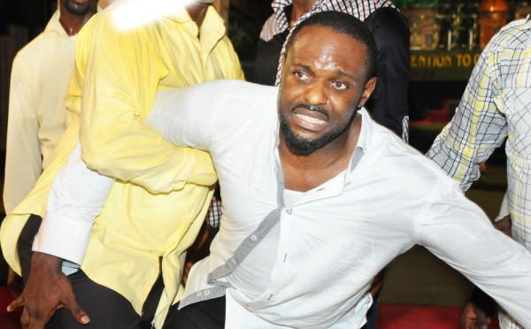 Jim Iyke being 'delivered'