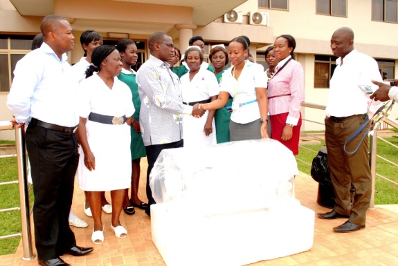 Mrs Rhoderlyn E. Mensah, a Manager at MTN (3rd right) making the presentation to officials of the Achimota Hospital.