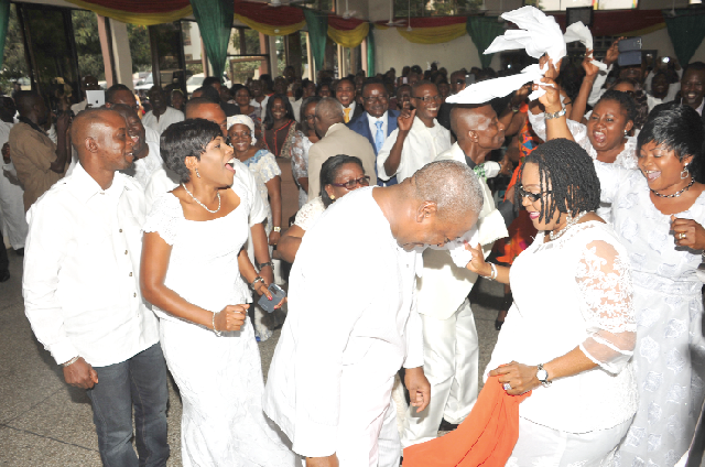 President Mahama and his wife, Lordina, dancing at the Ringway Gospel Centre of the Assemblies of God Church in Accra yesterday. Picture: EBOW HANSON