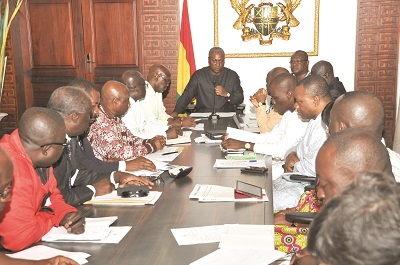 President Mahama (table head) addressing the leaders of the Private Enterprise Foundation during their maiden meeting at the Flagstaff House in Accra. Picture: EBOW HANSON 