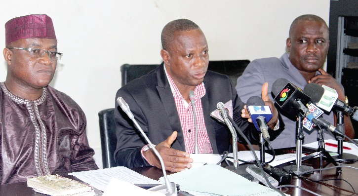 Mr David Oppon-Kusi (middle) making a statement at the press conference. Those with him are Mr Osei Kyei-Mensah-Bonsu (left), Minority Leader, and Mr Joe Appiah (right), MP for Ablekuma North