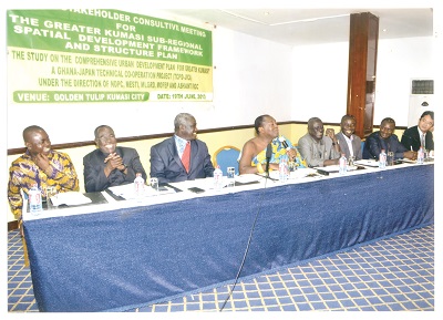  Mr Paul Victor Obeng (4th right), Chairman of NDPC, Mr Eric Opoku (2nd left), the Ashanti Regional Minister,  Mr Oteng Adjei (2nd right), Minister of Environment, Science, Technology and Innovation, and Mr Fuyaki Sagara, Japan International Co-oporation Agency (right), with other dignitaries at the workshop.