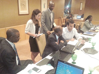 The Minister of Finance, Mr Seth Terkper (arrowed), with some members of the Eurobond Transaction Committee during the bidding. 