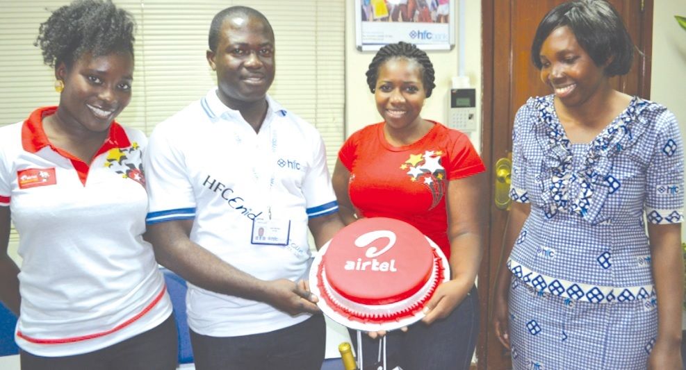 From left: Nana Ama Ahwoi (Airtel), James Batsa (HFC Bank), Audrey Aniagyei (Airtel) and an official from HFC Bank).