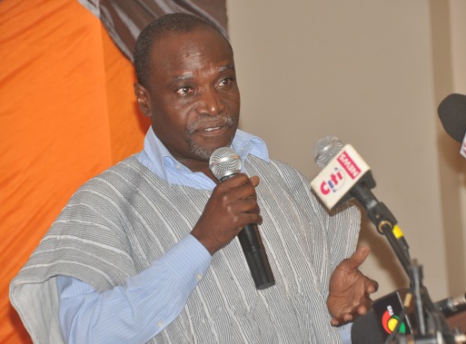 Mr Moses Asaga speaking at the event