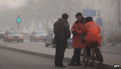 The air smells of coal dust and car fumes