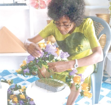 Mrs Marley exhibiting her floral skills at her shop.